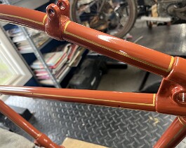 We have begun adding the pin striping to the frame.